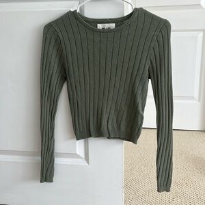 Rolla’s green sweater